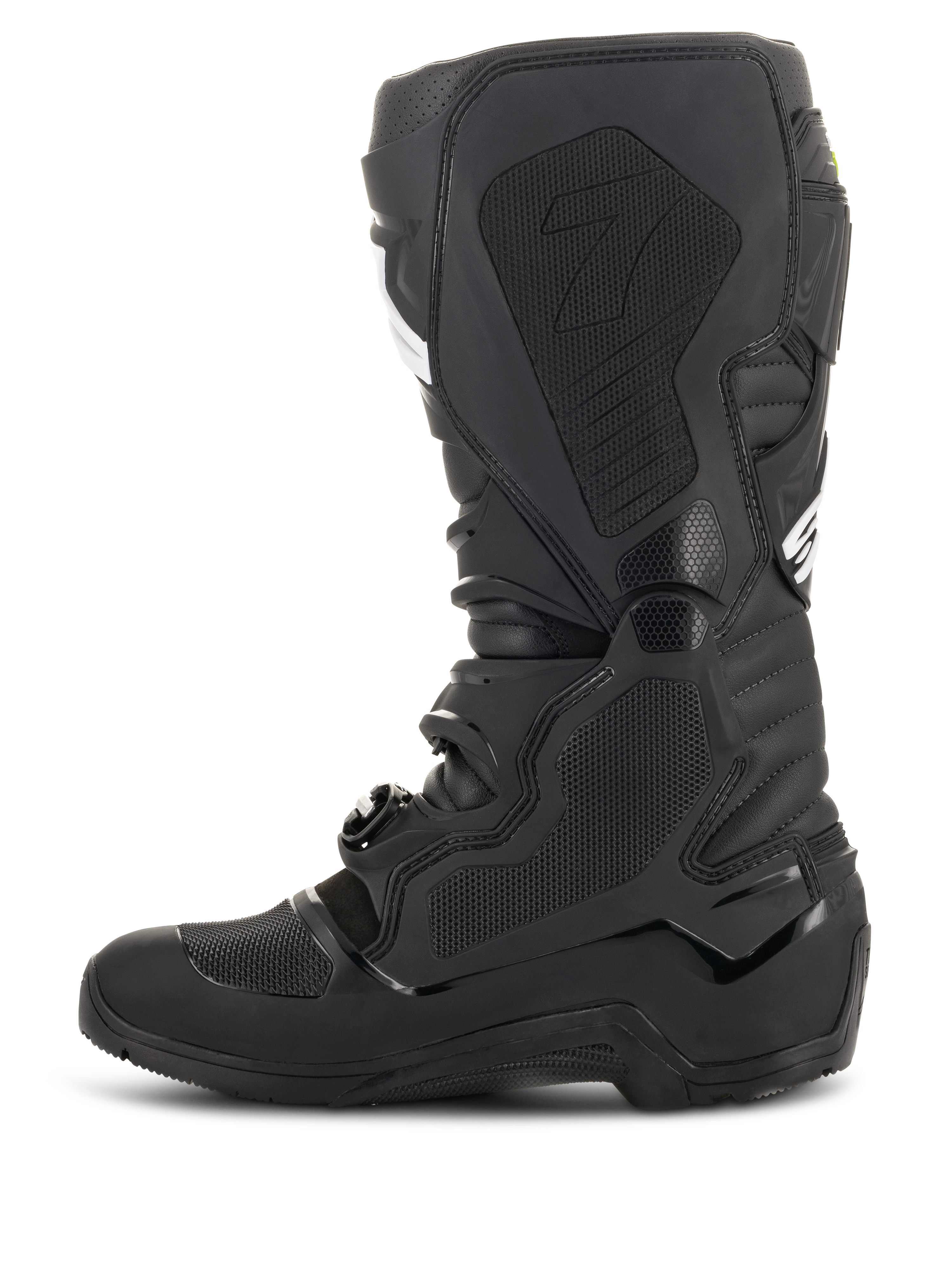 Alpinestars Tech 7 Enduro Drystar® Boots, Black, side profile view showing the medial side with textured honeycomb grip panels and the '7' logo, waterproof off-road motorcycle footwear for enduro racing.