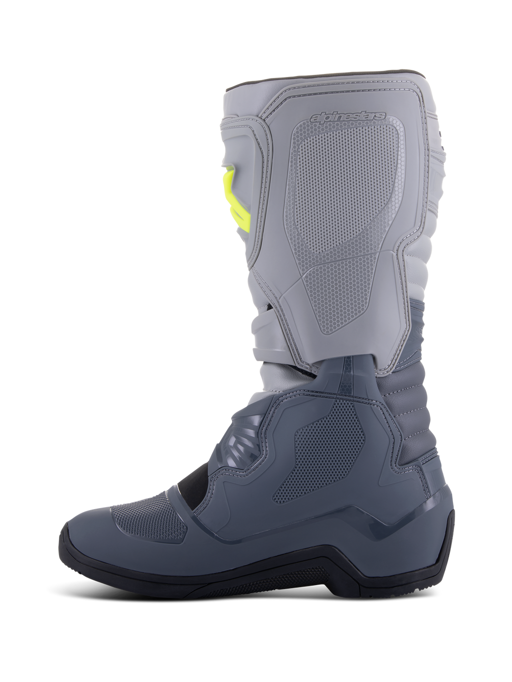 Alpinestars Tech 3 Stiefel, Motocross-Stiefel, Dunkelgrau, Hellgrau und Schwarz, Seitenansicht mit hellgrauem Oberteil und dunkelgrauem Unterteil sowie gelben Schnallenakzenten, TPU-Schutzplatten und strapazierfähiger schwarzer Sohle.