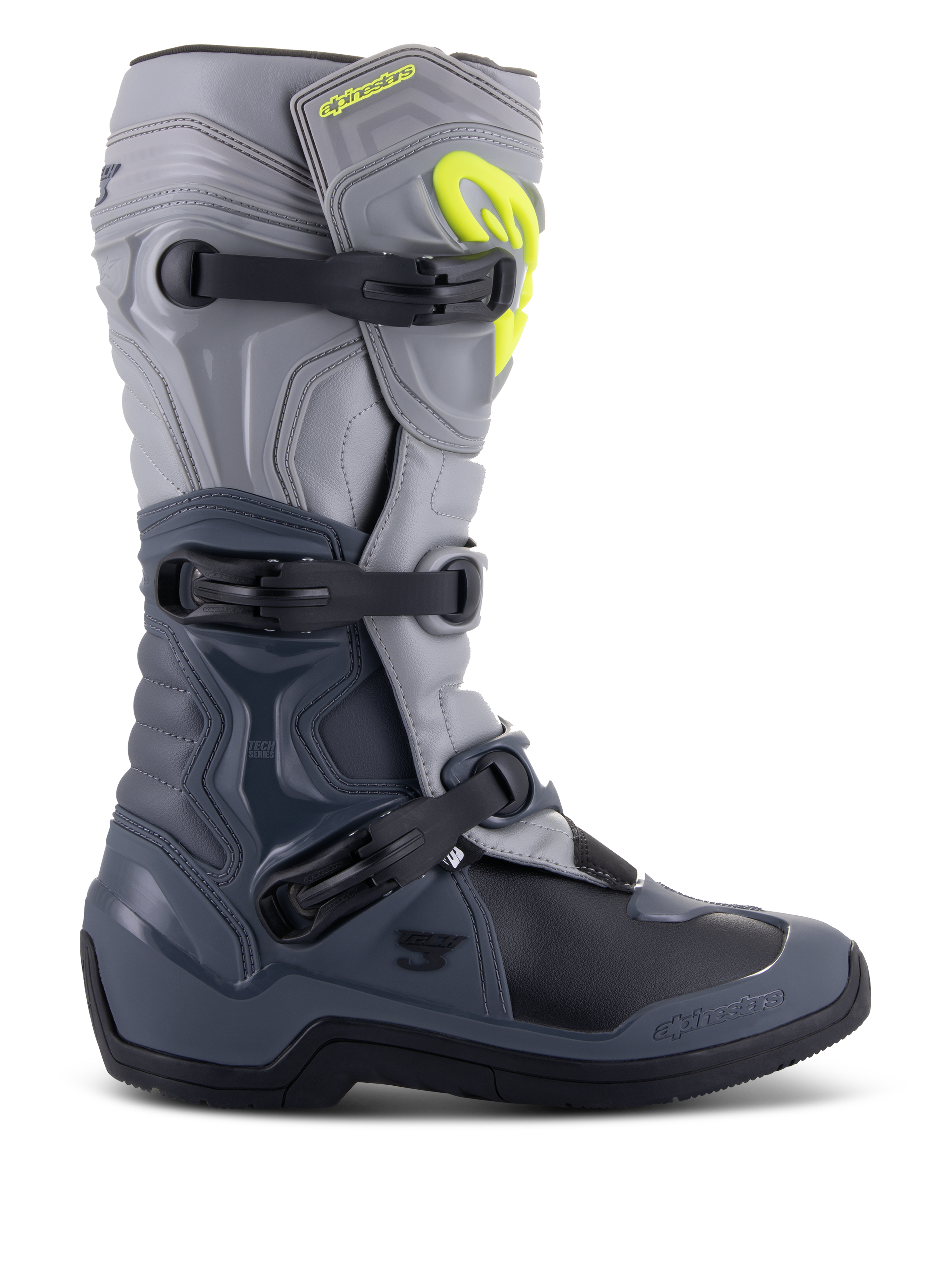 Alpinestars Tech 3 Stiefel, Motocross-Stiefel, Dunkelgrau, Hellgrau und Schwarz, Seitenansicht mit drei schwarzen Polymerschnallen, TPU-Schutzpaneelen und einem leuchtend gelben Alpinestars-Logo im oberen Schienbeinbereich