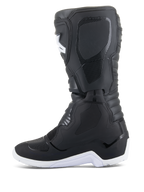 Alpinestars Tech 3 Enduro wasserdichte Stiefel, Motocross- und Enduro-Stiefel, Schwarz und Weiß, Seitenprofil-Ansicht mit texturierten Schutzpaneelen, weißer robuster Sohle und wasserdichtem Synthetik-Obermaterial für Offroad-Fahrten