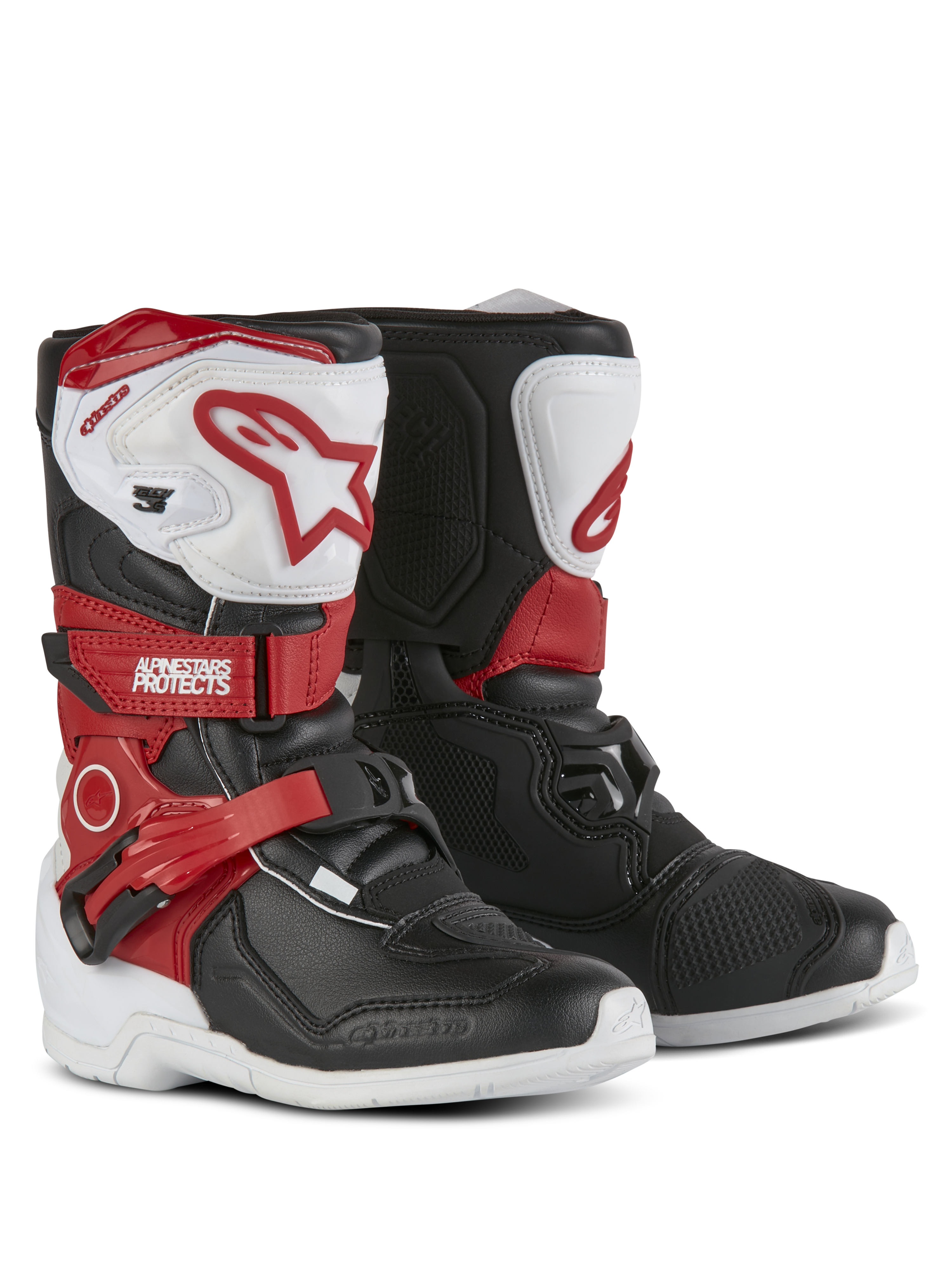 Alpinestars Kids Tech 3S Stiefel, Motocross-Stiefel, Weiß, Schwarz und Hellrot, mit schützenden TPU-Schienbeinplatten, roten Riemen mit Alpinestars-Branding, Schnallenverschluss und strapazierfähigen weißen Außensohlen.