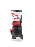 Alpinestars Kids Tech 3S Stiefel, Motocross-Stiefel, Weiß, Schwarz und Hellrot, Vorderansicht mit weißer Schienbeinplatte und rotem Logo, schwarzes Chassis mit roten Schnallenriemen, schützendes Offroad-Schuhwerk für junge Fahrer