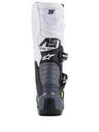 Alpinestars Tech 5 Stiefel, Motocross-Stiefel, Schwarz, Dunkelgrau, Weiß, Rückansicht mit weißem Schaft und Tech 5-Branding, grauen Akkordeon-Flexzonen und schwarzem Fersenschutz mit Tech Series-Logo