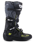 Alpinestars Tech 5 Stiefel, Motocross-Offroad-Stiefel, Seitenansicht, Schwarz und Cool Gray mit neongelben Akzenten, Camouflage-Muster, verstellbare Schnallen und robuste Schutzsohle.