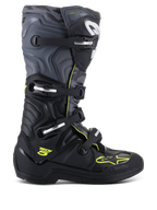 Alpinestars Tech 5 Stiefel, Motocross-Offroad-Stiefel, Seitenansicht, Schwarz und Cool Gray mit neongelben Akzenten, Camouflage-Muster, verstellbare Schnallen und robuste Schutzsohle.