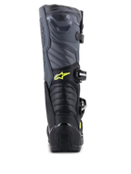 Alpinestars Tech 5 Stiefel, Motocross-Stiefel, Schwarz, Cool Gray und Gelb Fluo, Rückansicht mit Akkordeon-Flexzonen und Fersenschutz, gelbem Astars-Logo und geprägtem Tech Series Branding, strapazierfähige Mehrmaterial-Konstruktion für Offroad-Leistung