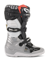 Alpinestars Youth Tech 7S Boots, Motocross Boots, Black Silver White and Gold, side profile showing buckle closure system, TPU protectors, and durable construction for youth riders.