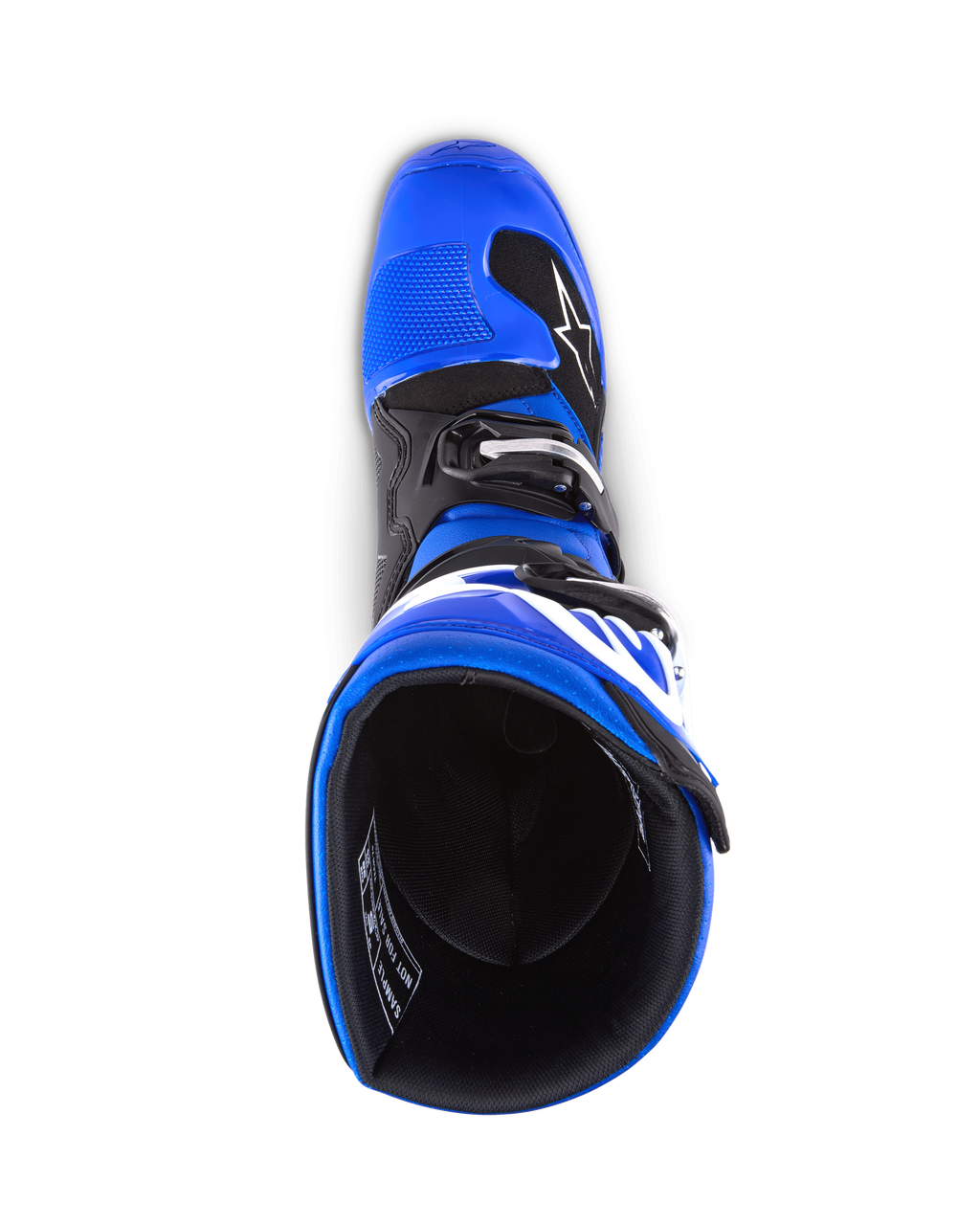 Alpinestars Youth Tech 7 S Boots, Motocross Boots, Blue Black and White, top-down view looking into the boot interior, showing blue outer shell and black lining, durable construction with white branding for youth motocross racing