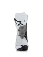 Alpinestars Supertech R Vented Stiefel, Weiß Mittelgrau Schwarz, Rückansicht mit perforierter Mikrofaser-Konstruktion, neu gestalteter grauer Fersenplatte mit Wabenstruktur, markantes schwarzes Logo an der oberen Wade, professionelles Racing- und Sport-Motorradschuhwerk