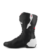 Alpinestars SMX-6 V3 Stiefel, Performance-Motorradstiefel, Schwarz-Weiß-Rote Grafik, Innenansicht, schwarze Mikrofaser-Konstruktion mit weißen TPU-Schutzpaneelen an Ferse und Wade, roten Akzenten und flexiblen Akkordeon-Zonen für verbesserte Beweglichkeit und Schutz.