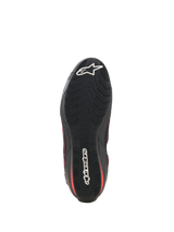 Alpinestars Celer Superair Schuhe, Motorradschuhe, Schwarz und Bright Red, Unteransicht mit der schwarzen ölbeständigen Gummilaufsohle, texturiertem wellenförmigem Profilmuster und weißem Alpinestars-Branding an Zehen und Ferse.