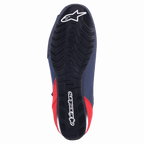 Alpinestars Austin Riding Shoe, Night Navy und Bright Red, Ansicht von unten zeigt schwarze Gummiaußensohle mit strukturiertem wellenförmigem Profil und weißem Alpinestars-Branding
