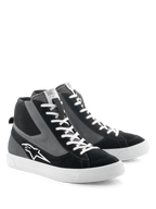 Alpinestars Stated Shoes, Motorcycle Riding Shoes, Black Gray and White, retro skate-inspired high-top design with white laces and vulcanized rubber sole, featuring the Alpinestars logo on the side and a blend of suede and canvas materials.