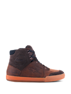 Alpinestars Chrome Crafted Drystar® Shoes, Brown Gum high-top urban riding sneakers, side view showing waterproof leather construction, dark brown suede accents, and a distinctive orange gum sole.
