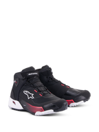 Alpinestars CR-X Damen Drystar® Motorradschuhe, Motorradschuhe, Schwarz, Weiß und Diva Pink, Dreiviertel-Frontansicht, Ripstop-Obermaterial mit weißem Alpinestars-Logo, pinkfarbene Akzente an der Zwischensohle und den Schnürösen, schlankes und schützendes Design für Touren