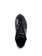 Alpinestars CR-X Women's Drystar Motorradschuh, Schwarz, Weiß und Diva Pink, Draufsicht mit technischem Ripstop-Obermaterial, pinkfarbenen Akzenten an den Schnürsenkelösen und Alpinestars-Logo auf dem Knöchelriemen und der Seite.
