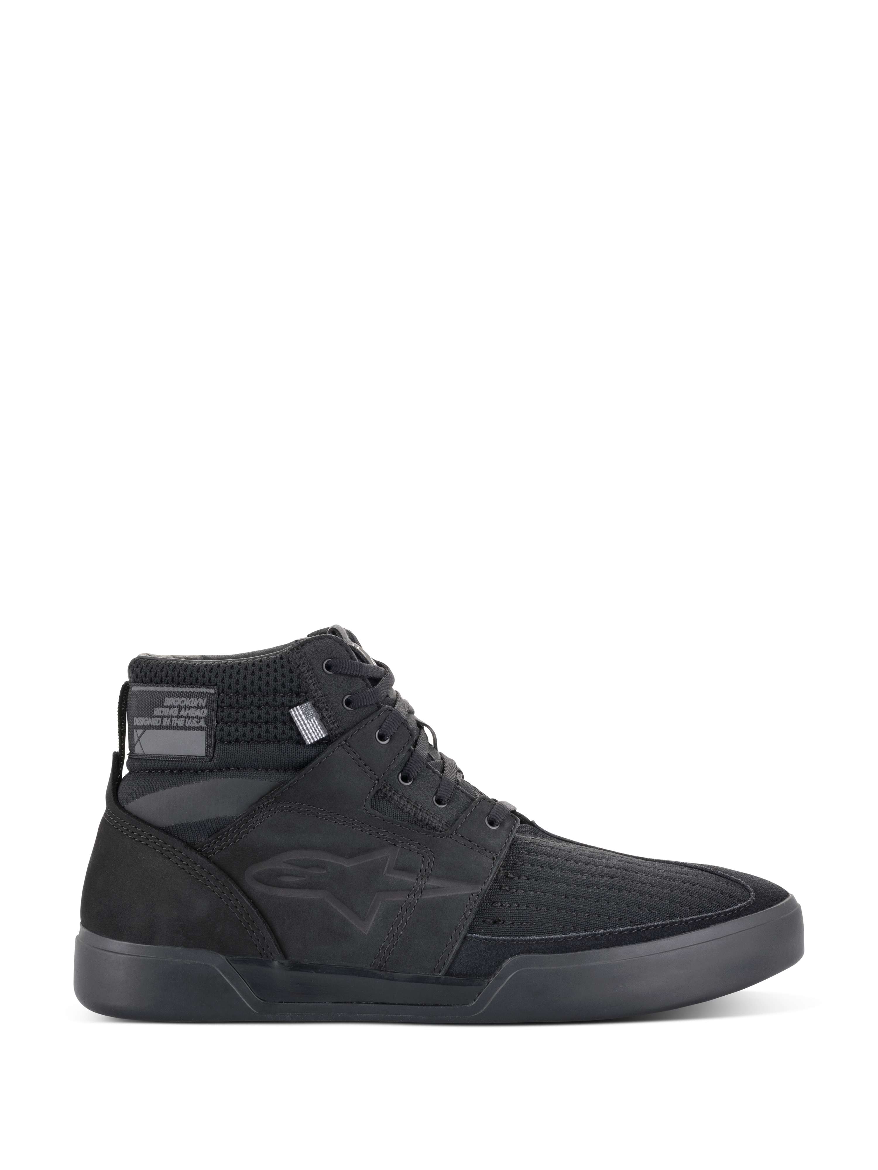 Alpinestars Primer Riding Shoes, Black Motorcycle Sneakers, High-Top Urban Riding Footwear, profile view, textured mesh upper, thick rubber sole, modern sporty design with a subtle star logo