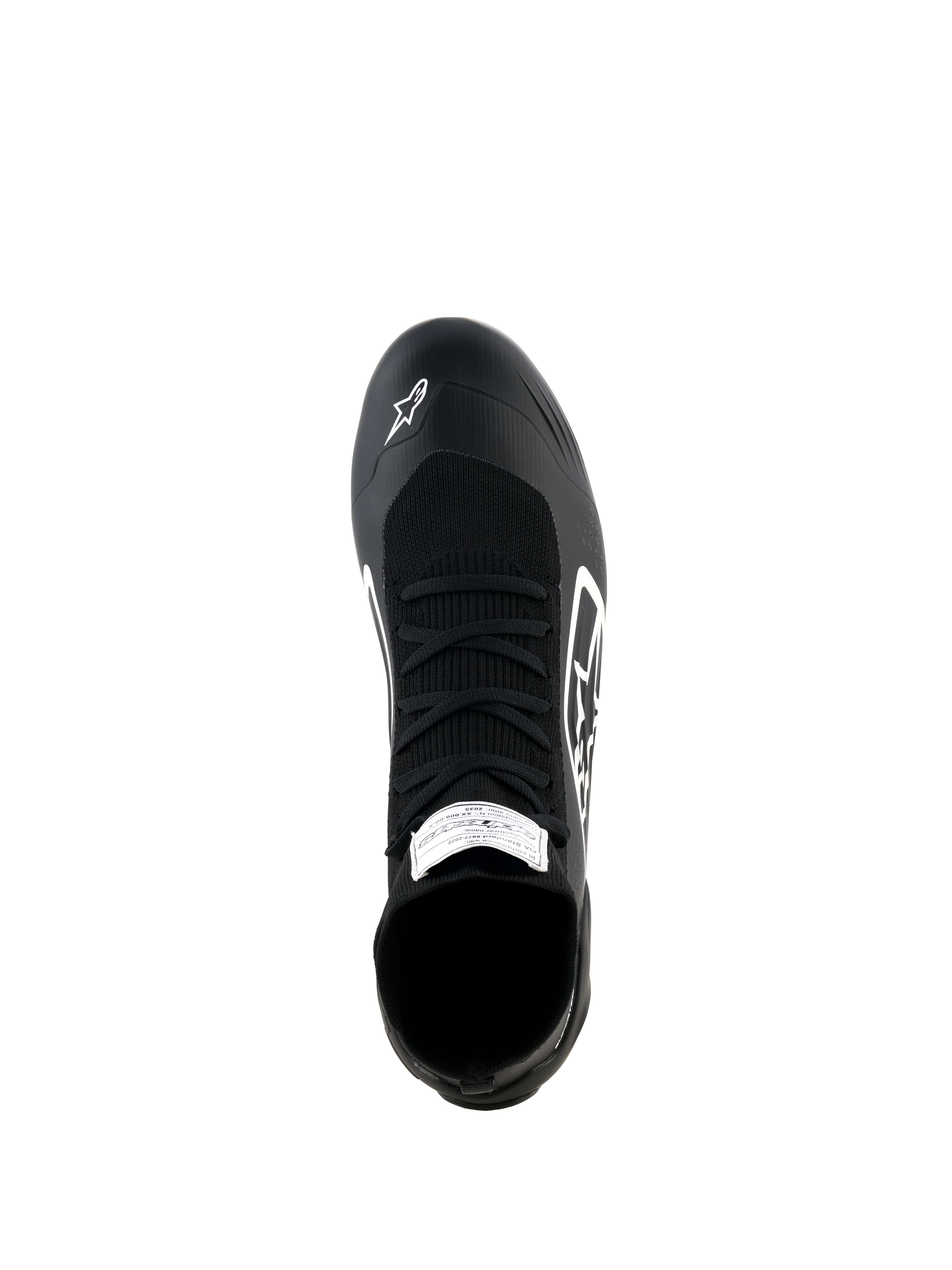 Alpinestars Supertech K Schuhe, Karting-Schuhe, Schwarz und Weiß, Draufsicht mit vollständig gestricktem Obermaterial, schwarzen Schnürsenkeln, weißem Alpinestars-Logo auf der Zehenkappe und FIA-Zertifizierungslabel auf der Zunge
