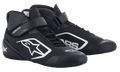 Alpinestars Tech-1 K V2 Schuhe, schwarz-weiße Karting-Rennschuhe, High-Top-Design mit perforierter Mikrofaser-Belüftung, duales Verschlusssystem mit Schnürsenkeln und Klettverschlussriemen, markantes weißes Logo, Motorsport-Performance-Schuhwerk