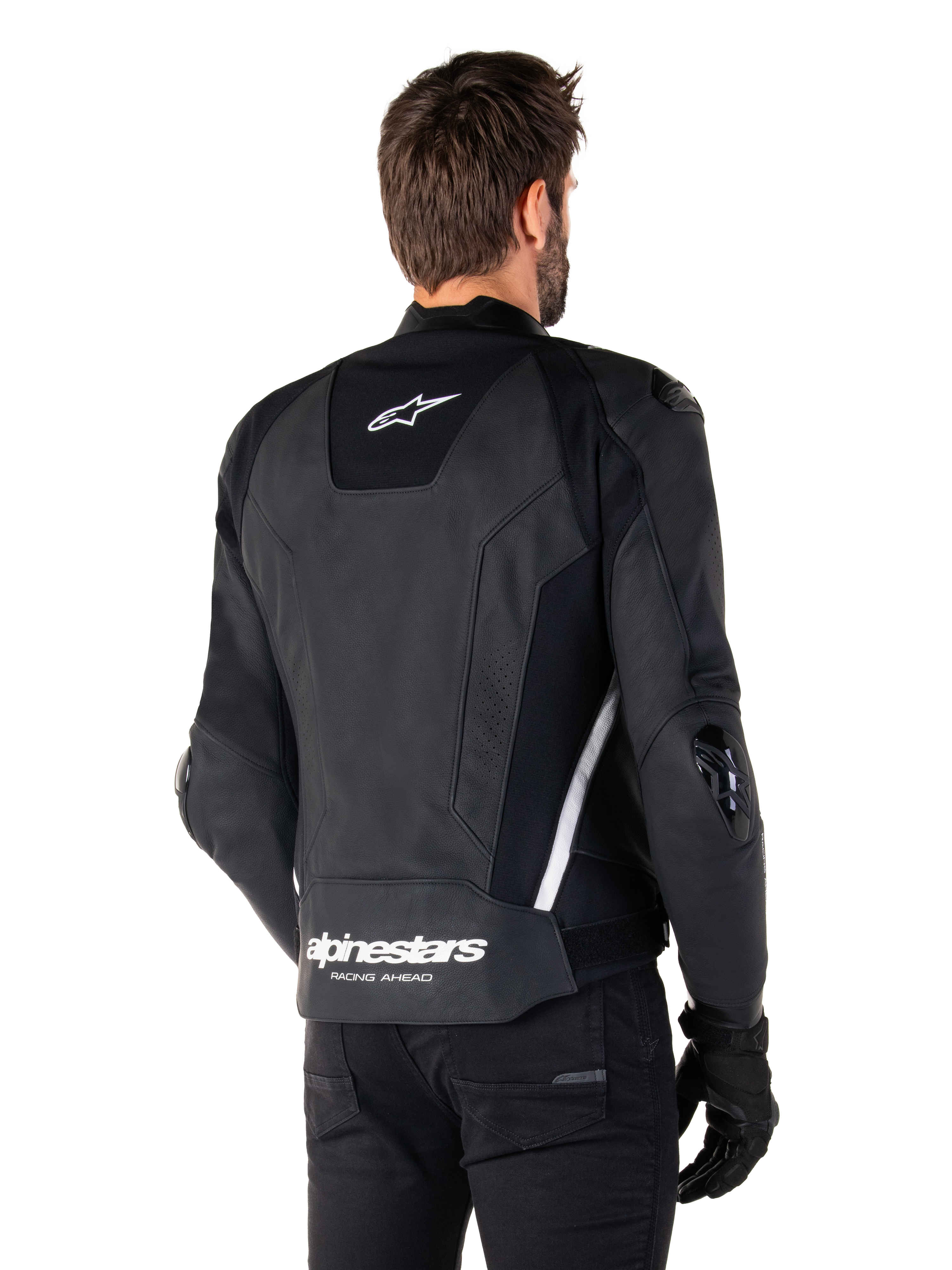 Alpinestars Missile V3 Lederjacke, Rückansicht, Schwarz und Weiß, mit Alpinestars Stern-Logo auf dem oberen Rücken und Wortmarke auf dem unteren Rücken, Schutz-Slider an Ellbogen und Schultern, Premium-Leder-Rennausrüstung