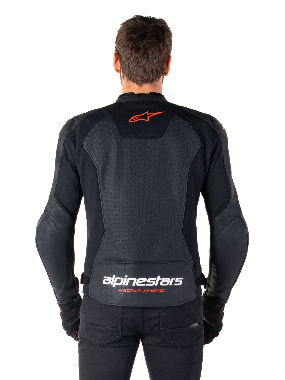 Alpinestars Faster V3 Airflow Leather Jacket, Black, rear view featuring perforated leather panels for ventilation, red Alpinestars star logo, and white branding on the lower back, worn with black pants and gloves.