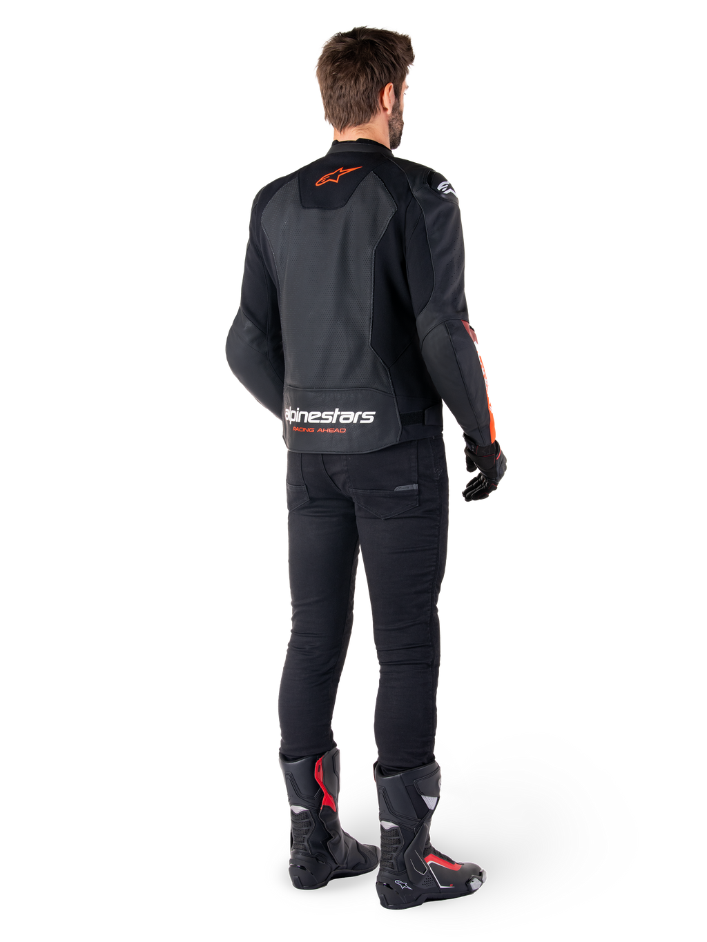 Alpinestars Faster V3 Airflow Leather Jacket, Black and Red Fluo, seen from behind on a rider, featuring perforated leather panels and bold branding, worn with black pants and motorcycle boots, sport riding attire.
