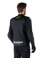 Alpinestars Faster V3 Airflow Lederjacke, Schwarz, Weiß und Gelb Fluo, Rückansicht, mit einem großen perforierten Leder-Rückenpanel zur Belüftung, gelbem Stern-Logo am Kragen und weißem Alpinestars-Schriftzug mit gelbem „Racing Ahead“-Text am unteren Saum, sportliche Motorradbekleidung