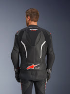 Alpinestars GP Force V2 Leather Suit - 2 Piece, Black White and Red Fluo, back view of leather jacket, featuring Tech-Air Ready logo, white accents, perforated leather panels, and accordion stretch for mobility.