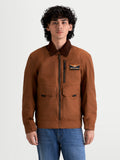 Alpinestars Mustang Waterproof Jacket, men's urban contemporary motorcycle textile jacket in dark rust and dark brown, front view on a model wearing workwear-styled riding apparel with a corduroy collar.