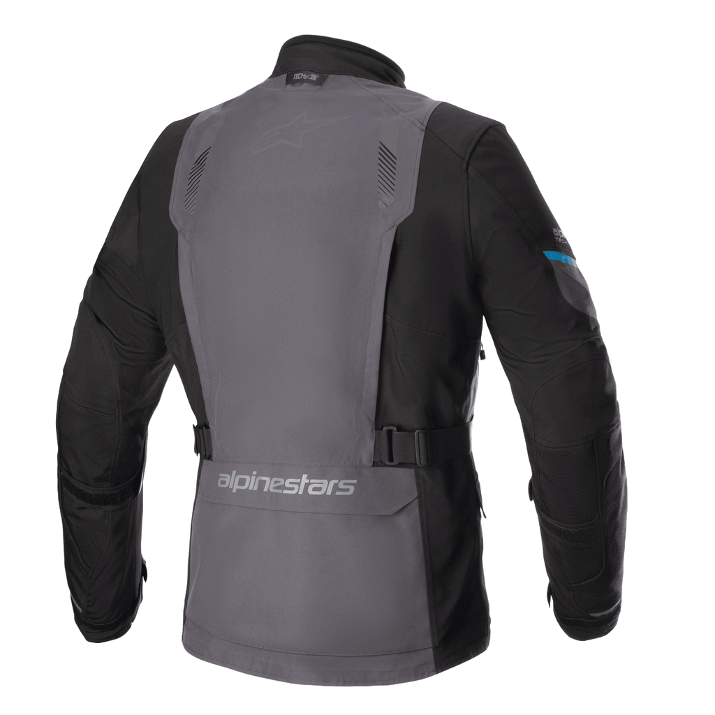 Alpinestars Monteira Drystar® XF Jacket, Adventure Touring Motorcycle Jacket, Tar Gray and Black with Methyl Blue accents, rear view showing a large gray back panel, adjustable waist straps, and Alpinestars branding on the lower back.