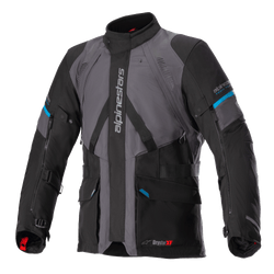 Alpinestars Monteira Drystar XF Jacke, Adventure-Touring-Motorradjacke, Grau und Schwarz mit methylblauen Akzenten, mehrere Fronttaschen, verstellbare Taillengurte, vertikales Alpinestars-Branding auf der Brust, strapazierfähige wasserdichte Textilkonstruktion