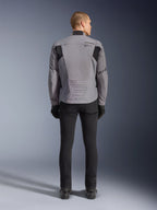 Alpinestars SMX Waterproof Jacket, Rear view, Dark Gray and Black, featuring black textile panels on shoulders and a sport-fit design, paired with black pants and gloves for a complete motorcycling look