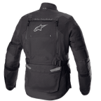 Alpinestars Bogotá Pro Drystar® Jacke, Rückansicht, Schwarz, Textil-Motorradjacke mit großem Belüftungspanel am Rücken, Alpinestars-Logo, 'TECH TOURING'-Schriftzug, verstellbare Taillengurte und Akkordeon-Stretcheinsätze an den Ellbogen.