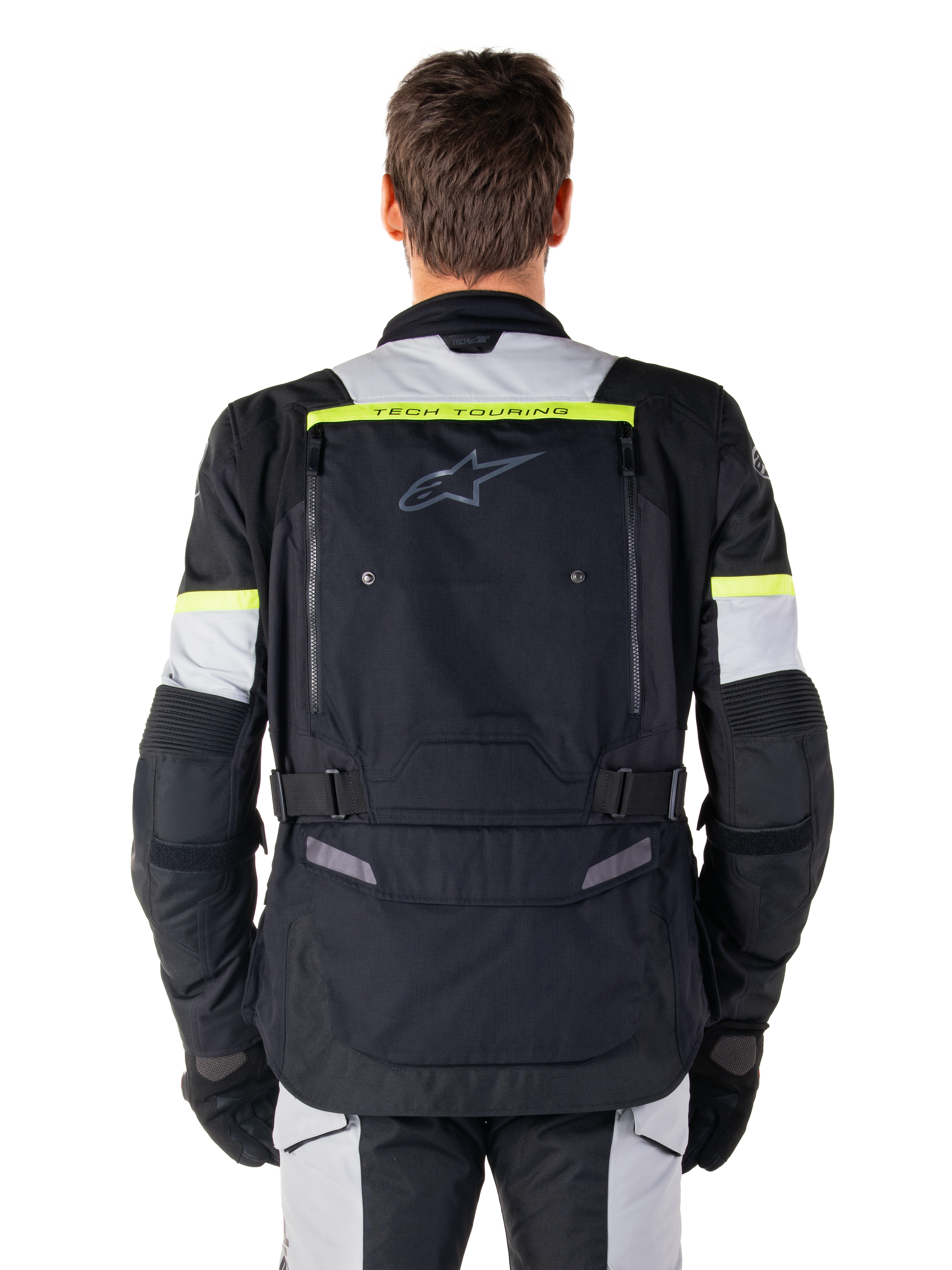 Alpinestars Bogota' Pro Drystar® Jacke, Adventure-Touring-Motorradjacke, Schwarz, Ice Gray und Gelb Fluo, Rückansicht mit „TECH TOURING“-Branding auf einem fluoreszierenden gelben Streifen, großem Belüftungspanel am Rücken und verstellbaren Taillengurten, technische Ganzjahresausrüstung