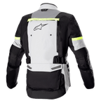 Alpinestars Bogota' Pro Drystar® Jacket, rear view, Ice Gray Dark Gray and Yellow Fluo, featuring a large back ventilation panel, fluorescent yellow reflective accents, and adjustable waist straps, motorcycle adventure touring gear