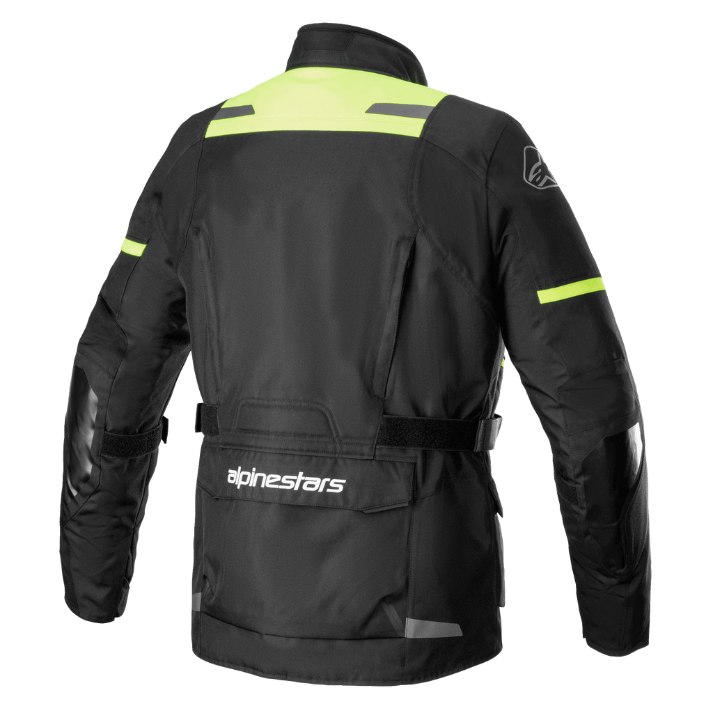 Alpinestars Andes V3 Drystar® Jacket, back view of adventure motorcycle jacket in Black and Yellow Fluo, featuring a large lower back utility pocket with Alpinestars logo, high-visibility shoulder panels, and adjustable waist straps.