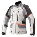 Alpinestars Women Stella Andes V3 Drystar Jacket, Motorcycle Touring Jacket, Ice Gray with Dark Gray and Black panels, bright Coral accents, featuring zippered chest vents, large flap pockets, and adjustable waist straps, technical textile construction for all-weather adventure riding