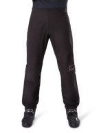 Alpinestars Amt 8 Stretch Drystar® XF Pant Liner, Black, sleek waterproof and windproof layer, featuring AMT branding on the leg, shown worn with black riding boots, streamlined and ergonomic adventure touring design.