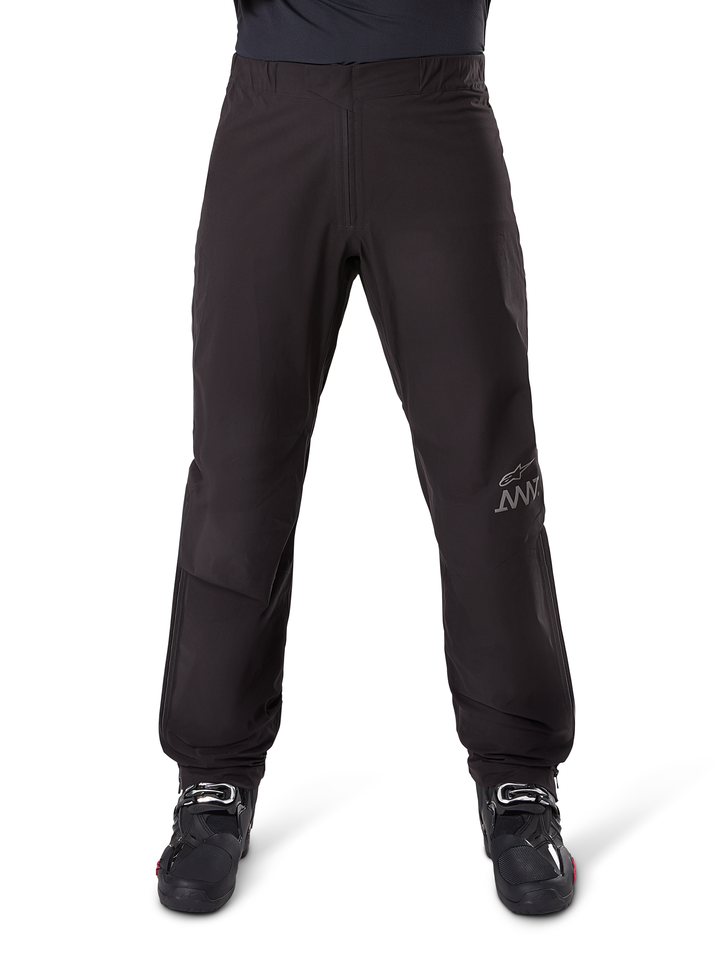 Alpinestars Amt 8 Stretch Drystar® XF Pant Liner, Black, sleek waterproof and windproof layer, featuring AMT branding on the leg, shown worn with black riding boots, streamlined and ergonomic adventure touring design.