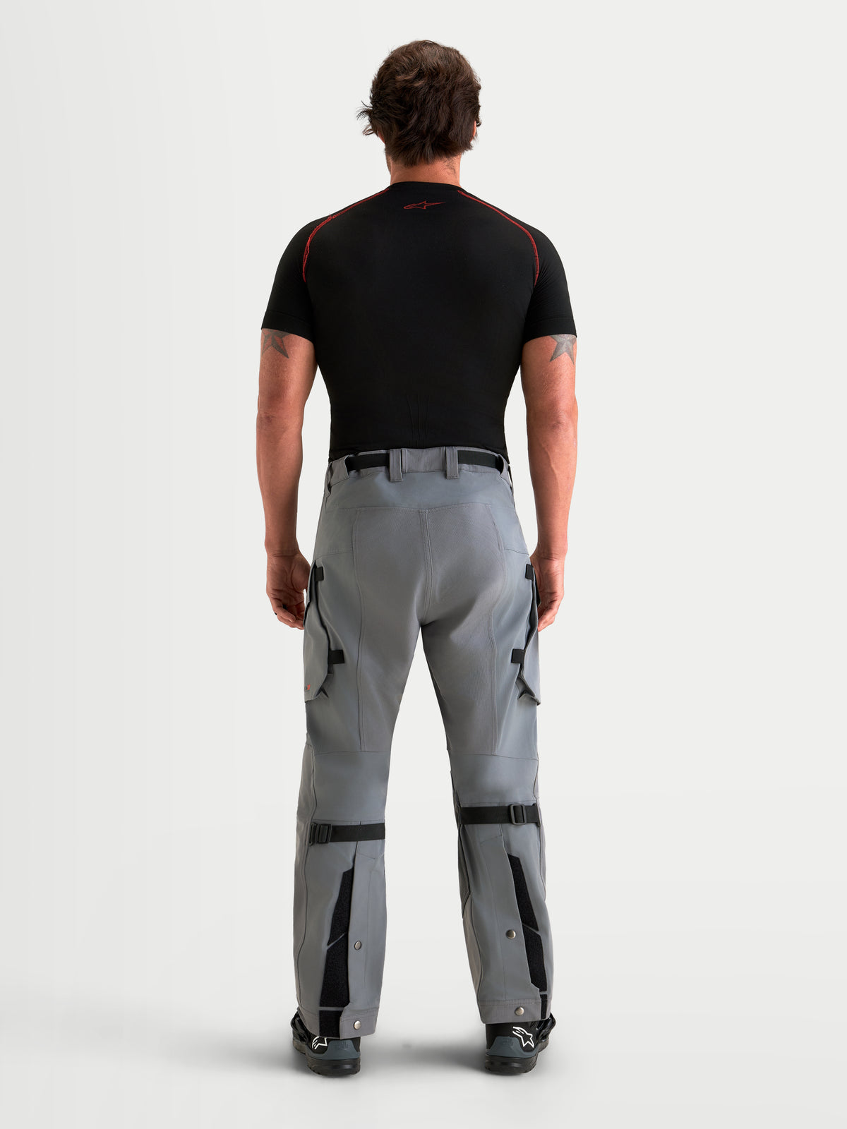 Alpinestars Maxdura Drystar XF Laminated Pants, Men's Adventure Motorcycle Pants in Dark Gray, rear view showing waterproof textile construction, integrated waist belt, and adjustable lower legs