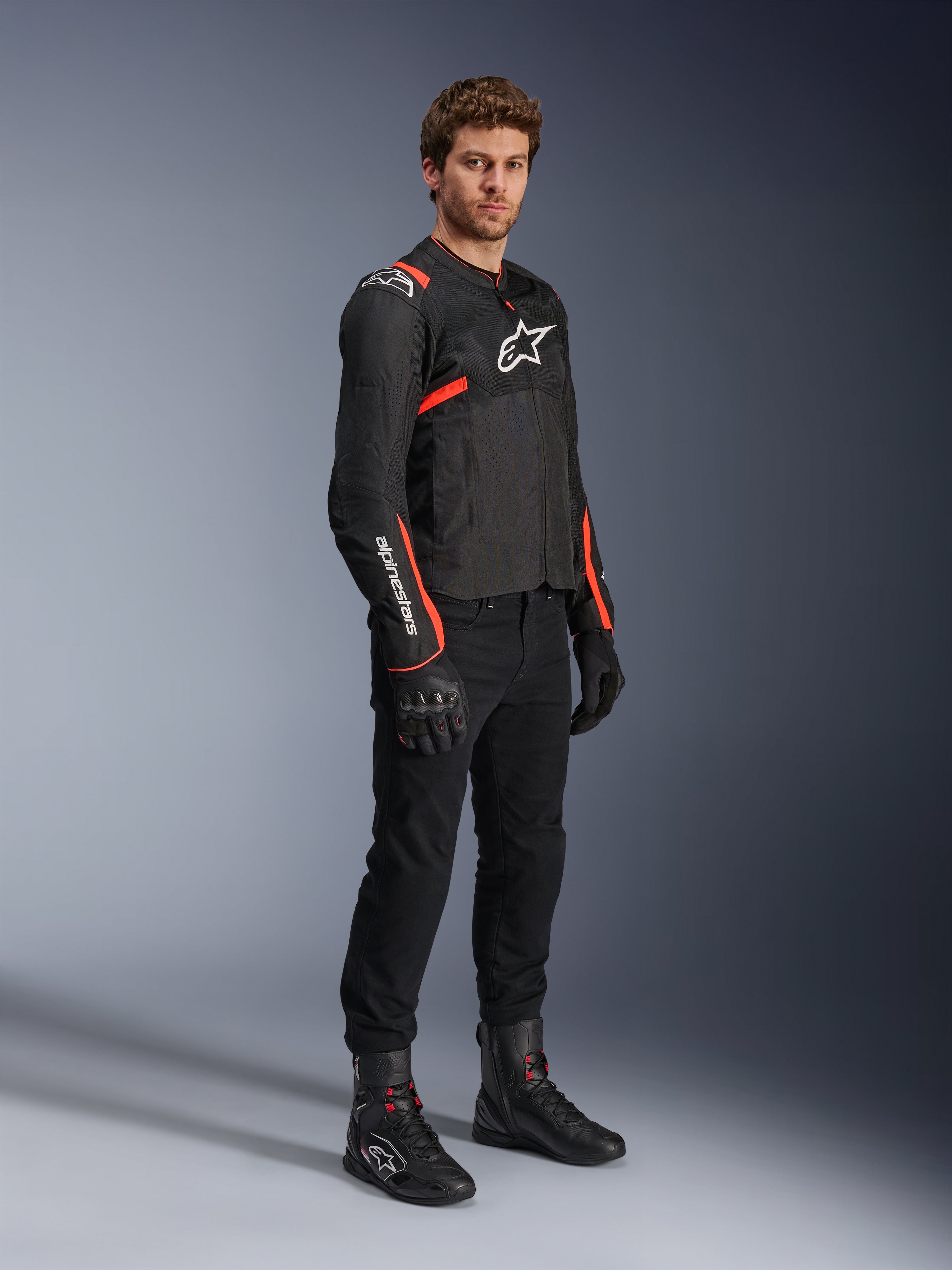 Alpinestars T-SPS Air V2 Jacke, Herren-Motorradjacke aus Textil in Schwarz und Rot Fluo mit belüfteten Mesh-Einsätzen.