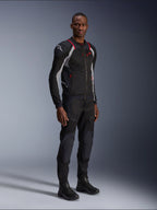 Alpinestars Troop-Air Pro Jacket, Black Ash Gray and Bright Red, technical mesh armored jacket, featuring red accents and white logo on shoulder, worn with matching black pants and boots, modern urban motorcycle apparel