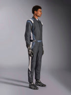 Alpinestars GP Pro Comp V2 FIA Suit, Men's Auto Racing Suit in Black, Asphalt, and White, side profile on model.
