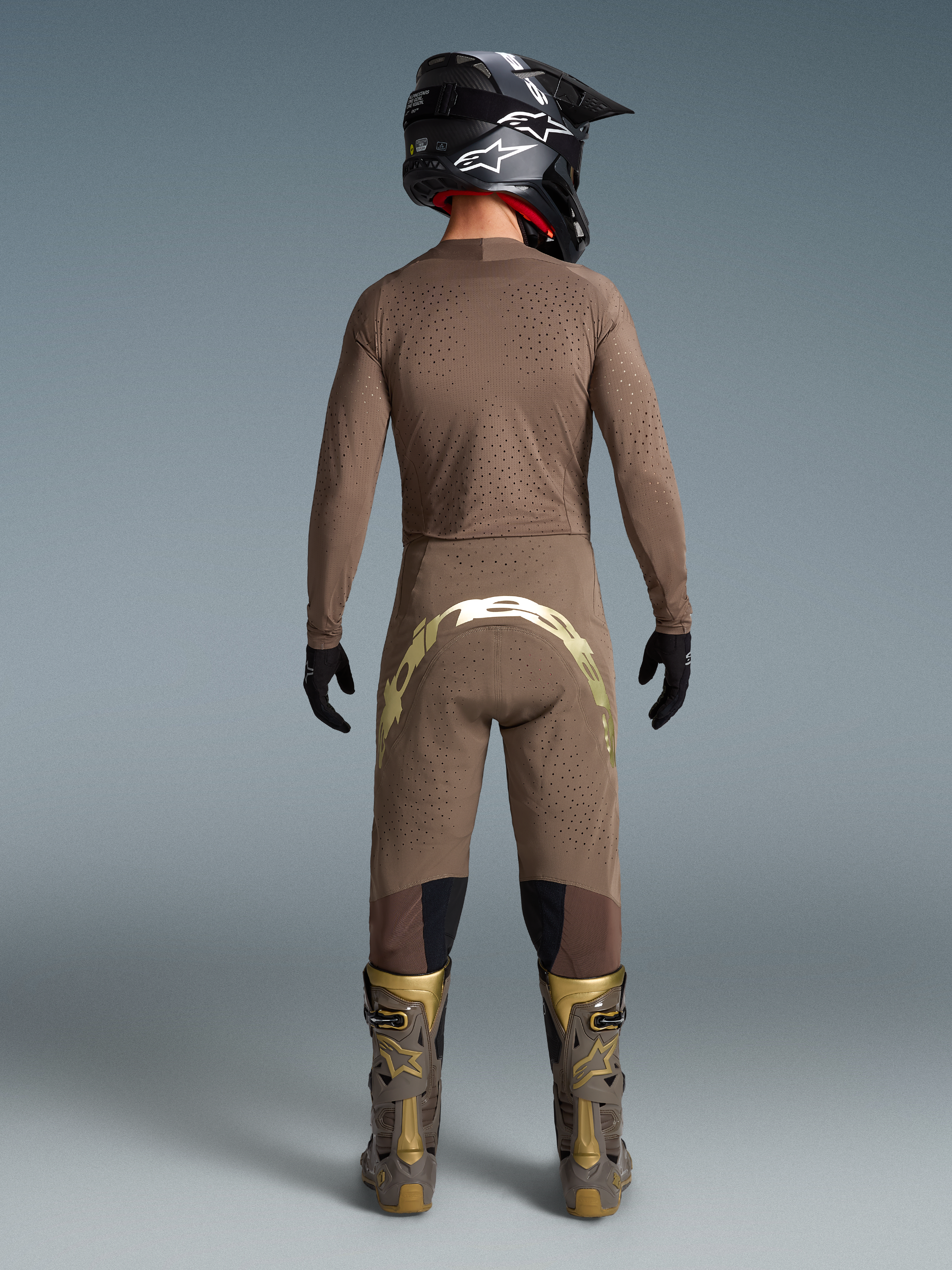 Alpinestars Limited Edition Supertech Air Gold Motocross-Set, belüftetes Herren-Trikot, Hose und Stiefel, Braun und Gold.