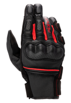 Alpinestars Phenom Leather Gloves, Motorcycle Racing Gloves, Black and Bright Red, perforated hard knuckle guard, premium goat leather construction, red accordion stretch inserts, and Alpinestars branding on the side.