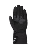 Alpinestars Wt-1 Drystar® isolierte Handschuhe, Motorradhandschuhe, Schwarz, Handflächenansicht mit verstärkten Textil-Grip-Bereichen, lange Manschette mit weißem Alpinestars-Logo auf dem Riemen, wetterfeste Konstruktion für Straßenfahrten