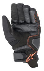 Alpinestars SMX-1 Drystar® Handschuhe, Motorradhandschuhe, Schwarz und Fluo-Rot, Handflächenansicht mit verstärkter Leder- und Wildlederkonstruktion, gepolsterten Aufprallzonen und Klettverschluss am Handgelenk mit rotem Stern-Logo.