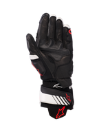 Alpinestars GP Plus R v3 Leather Gloves, Black White and Red Fluo, palm view showing full leather construction with reinforced padding, white wrist strap with red Alpinestars logo, racing-inspired protective gear for motorcycle riders