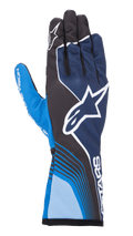 Alpinestars Tech-1 K Race V2 Future Handschuhe, Kart-Rennhandschuhe, Marineblau und Hellblau mit schwarzen Akzenten, großes weißes Stern-Logo, dynamische geschwungene Linien, Mesh-Einsätze an den Fingern, sportliches Motorsport-Design mit weißem Branding