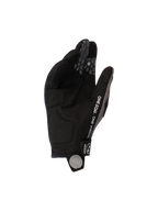 Alpinestars 2026 Pro-Dura Gloves, Black Gray, view of synthetic suede palm and silicone honeycomb finger grips, featuring 'ONE GOAL. ONE VISION.' text and white spiral logo on the pull tab, durable off-road motorcycle gear